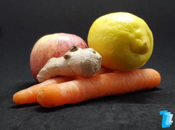 Ingredients for anti-snoring juice with ginger, lemon, carrots and apples